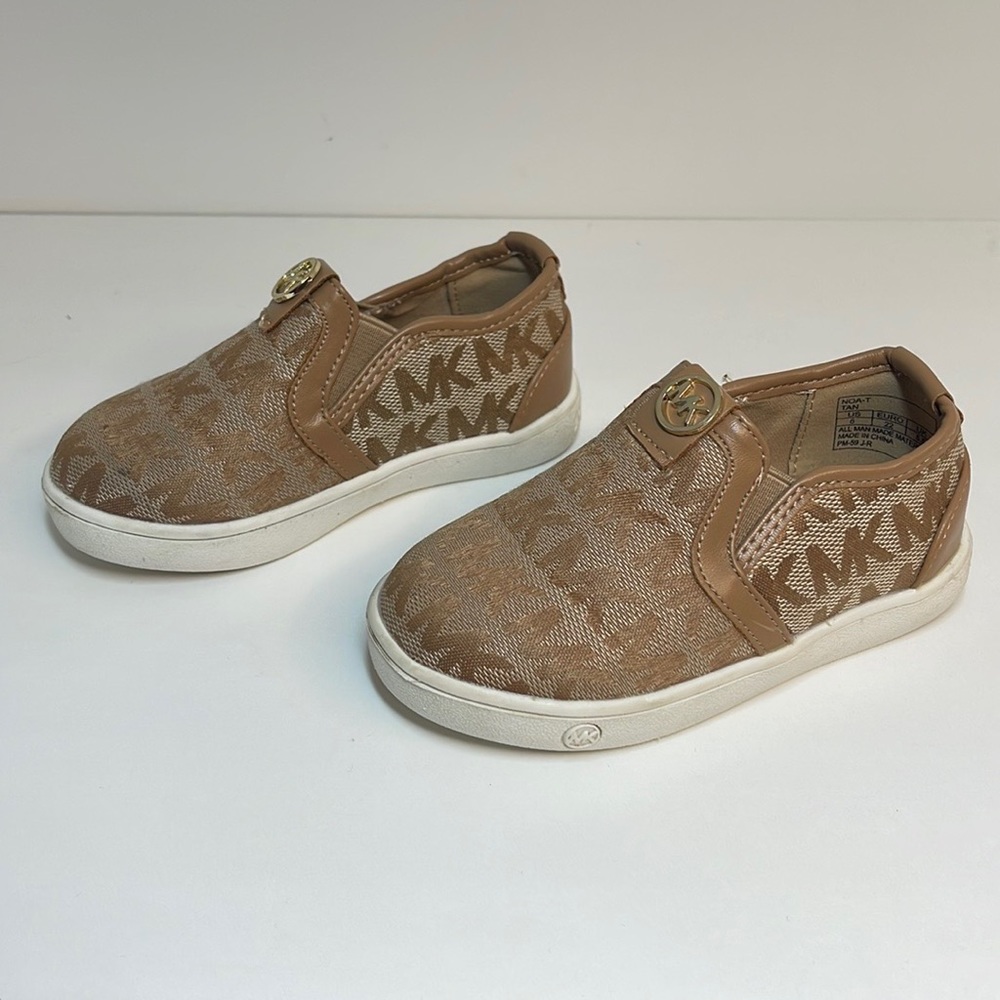 Michael Kors Kid’s Slip On Monogram Shoe.